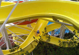 Woman on a tube riding the Superflume